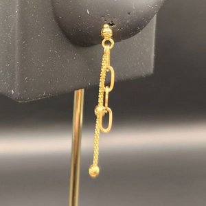  21  21K Gold Heart Earrings