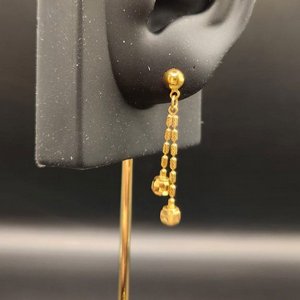   21  21K Gold Heart Earrings